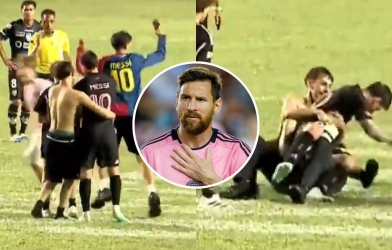 Người đàn ông cởi trần ôm ấp Messi ngay trên sân
